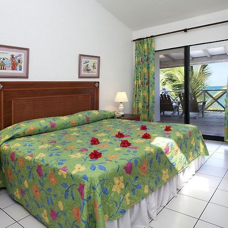 Coconut Beach Club Resort St. John's Стая снимка
