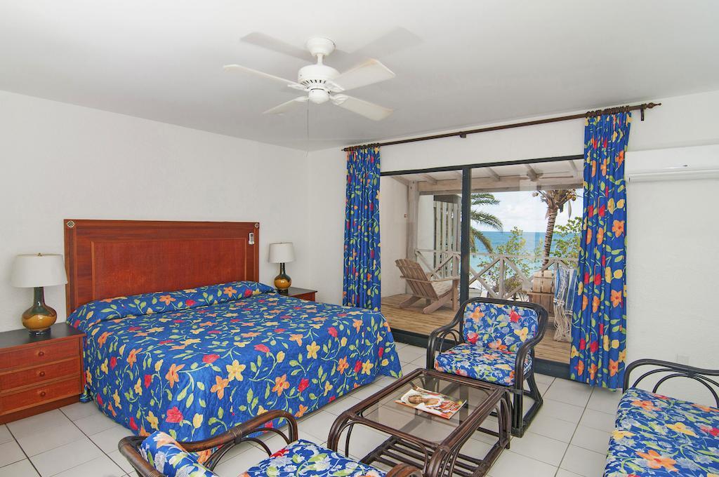 Coconut Beach Club Resort St. John's Стая снимка